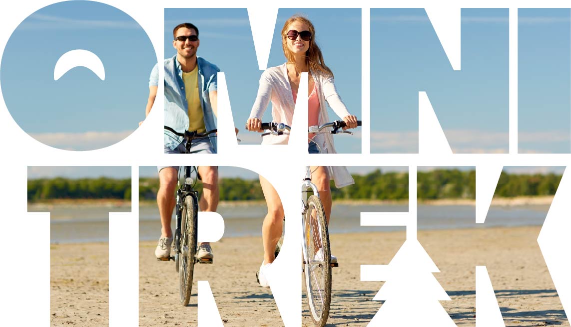 AdobeStock_178106870w logo omnitrek z ludźmi jadącymi na rowerach